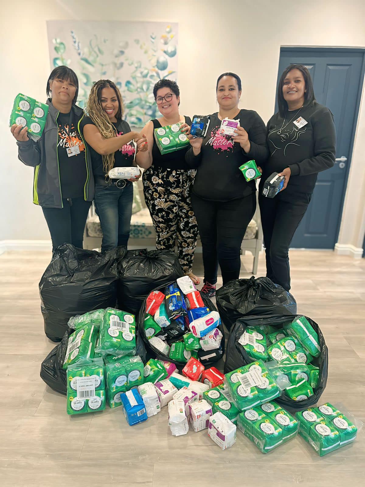 Packets of sanitary pads handed to the Woman2Woman team